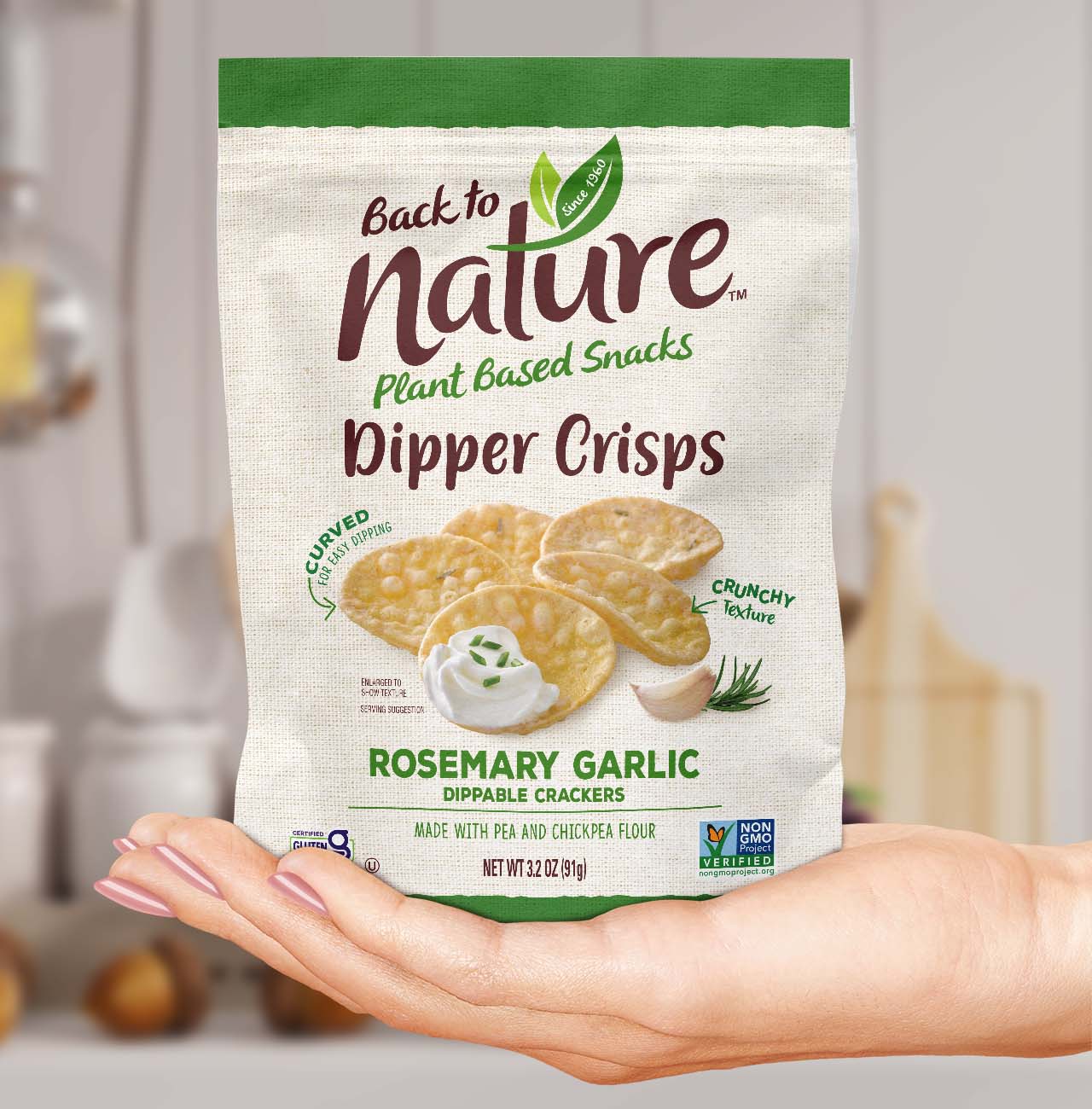 Back to Nature Dipper Crisps in a woman's hand